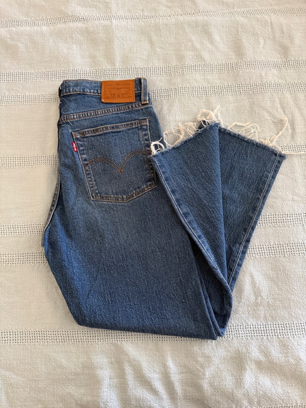 Levi's Dark Blue High-Rise Raw Hem Cropped Jeans